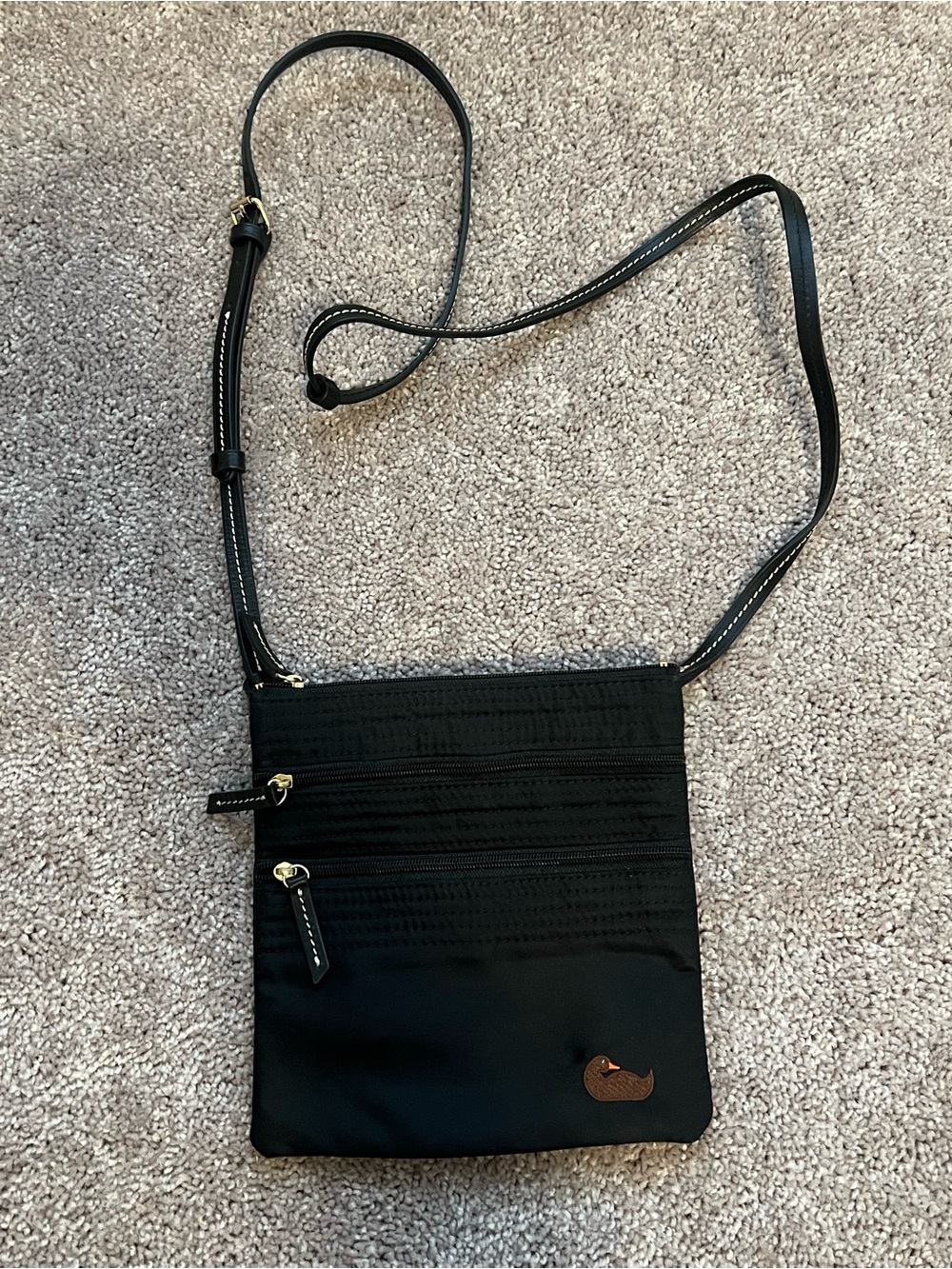 Dooney & Bourke Black Crossbody Bag with Brown Logo Accent